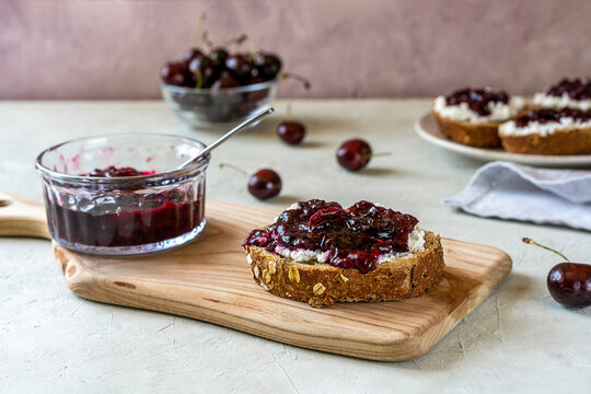 Wholewheat toasts with ricotta and homemade sweet cherry jam