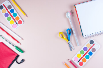 Top view of a set of school supplies with copy space.