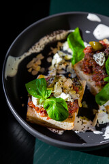 Sandwiches with cheese, meat, basil, almonds, kumquat