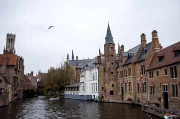 Fototapeta na wymiar Brugge, Belgium - March 23, 2019: Classic view of the historic city center of Brugge, West Flanders province.