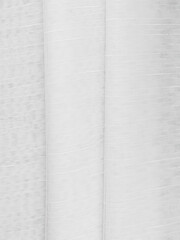 Fototapeta premium Tulle curtains white and yellow texture