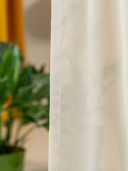 Tulle curtains white and yellow texture