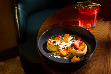 A slice of cheesecake with thyme, prosciutto, parmesan, basil