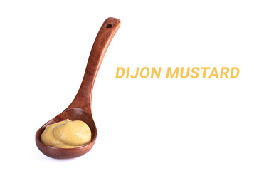 Wooden spoon with Dijon mustard on a white background and the inscription DIJON MUSTARD.