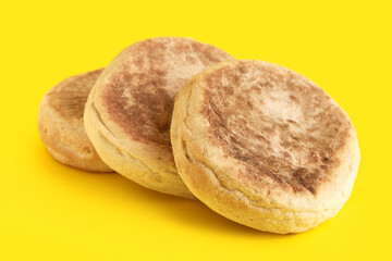 Bolo de caco. Traditional portuguese bread on yellow background