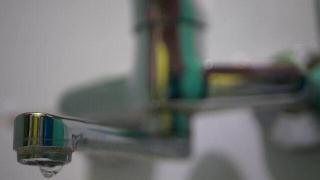 Static Shot From An Interesting Angle Of A Polished Bathroom Faucet.