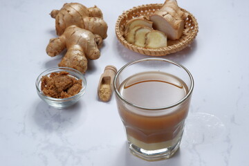 Fototapeta na wymiar bandrek Sundanese hot drink of herbal tea.made of a mixture of ginger water, palm sugar and Sweetened condensed milk.