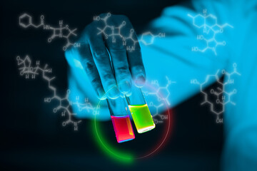 A woman scientist holding Organic chemistry sample glass vials in a laboratory - radioactive - fluorescence. A copy space black background. Organic medicinal chemistry laboratory.