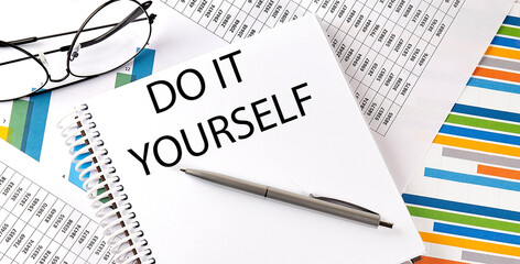 DO IT YOURSELF , pen and glasses on the chart, business concept
