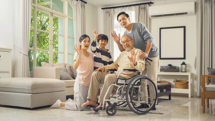 Portrait of happy smiling Asian Family living together at home in family relationship. reunion....
