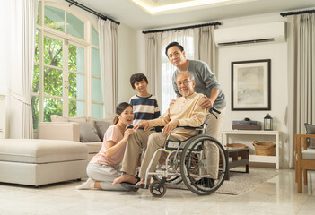 Portrait of happy smiling Asian Family living together at home in family relationship. reunion....