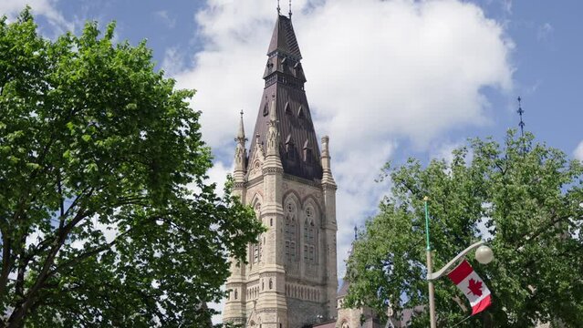 West Block tower on Parliament Hill, Ottawa, Canada on a sunny summer day  - 4K slow motion
