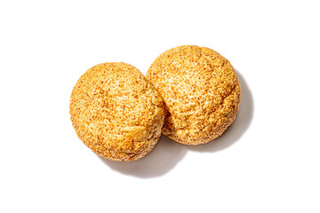 Fresh buns with sesame isolated on a white background. An indispensable ingredient for burgers