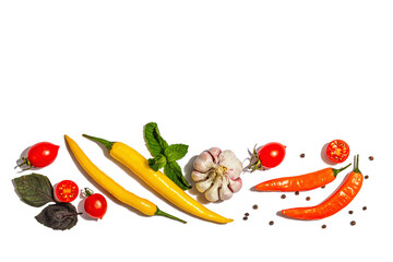 Cooking background with tomato, orange chili peppers, garlic and mint isolated on white background