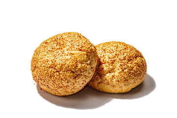 Fresh buns with sesame isolated on a white background. An indispensable ingredient for burgers