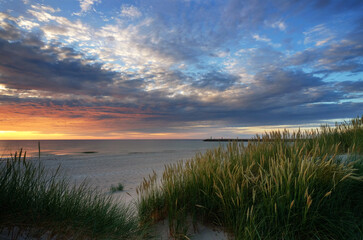 Krajobraz wybrzeża Morza Bałtyckiego, wydmy , plaża, zachód słońca, Kołobrzeg, Polska