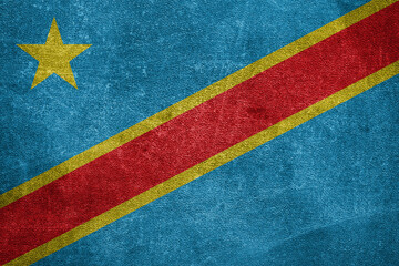 Old leather shabby background in colors of national flag. Democratic Republic of the Congo