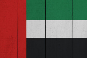 Patriotic wooden plank background in colors of flag. United Arab Emirates