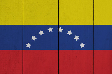 Patriotic wooden plank background in colors of flag. Venezuela