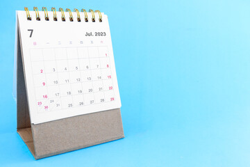 calendar July 2023 on a blue background