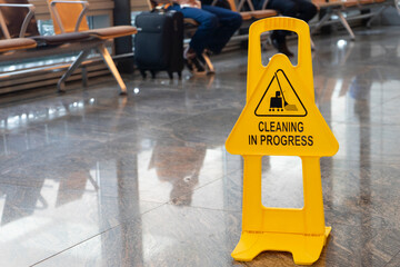 cleaning in progress caution sign in the airport