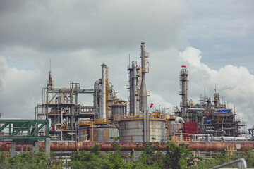 Fototapeta na wymiar Scene of oil refinery plant and storage tank oil of Petrochemistry industry