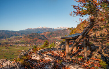 Bench resting place at the view point with the panoramic view of the valey and mountains at surise.