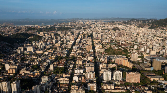 Aerial view of the North Zone of the City of Rio de Janeiro. In the background the Maracanã stadium, port area, and Guanabara Bay. Brazil