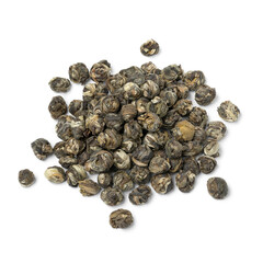 Heap of Chinese  Jasmine Dragon pearl tea close up isolated on white background