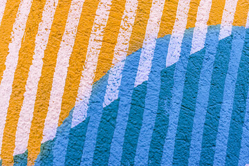 abstract spray graffiti art drawing on street city wall, texture of urban paint culture for design background