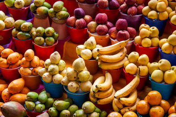 Mexican local street market displays colorful fresh tropical fruits in San Cristobal de las Casas,...