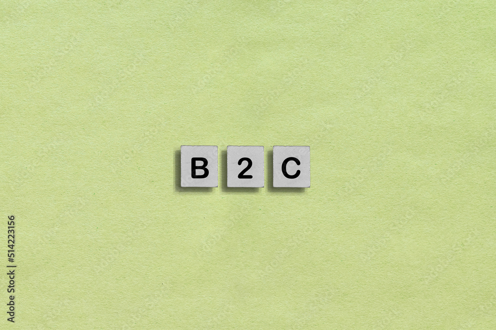 Fototapete homemade wooden tile with b2c abbreviation - business to consumer a process of selling products and 