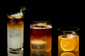 Various tape of cocktails on black background