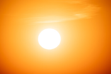 Gorgeous panorama scenic of the strong sunrise with silver lining and cloud on the orange sky. High quality photo