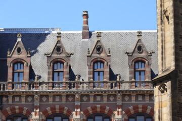 Fototapeta na wymiar Amsterdam Nieuwezijds Voorburgwal Street Former Post Office Historic Building Roof Detail, Netherlands