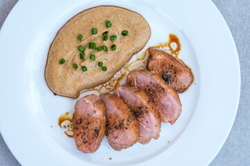 Sliced fried duck breast