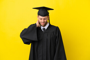 Young university graduate caucasian man isolated on yellow background with neckache