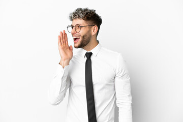 Business caucasian man isolated on white background shouting with mouth wide open to the lateral