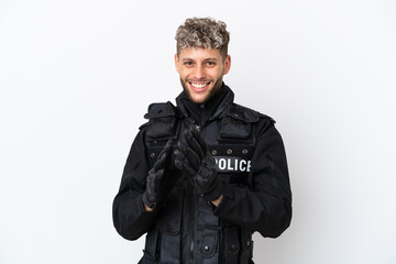 SWAT caucasian man isolated on white background applauding after presentation in a conference