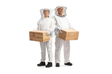 Bee keepers in usniform holding wooden crates
