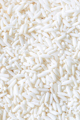 macro rice texture,Rice. Natural rice background and texture,Texture of rice with the bound pattern.