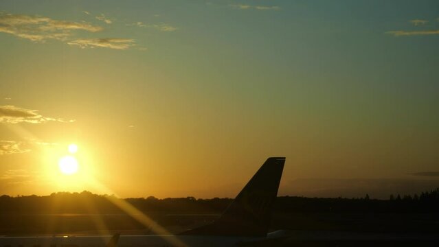 Sunset Airport Plane Taking Off