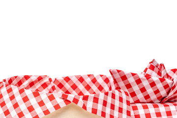 Fototapeta premium Closeup of a empty straw basket with a red checkered napkin and a folded ship isolated on a white background. For your food and product display montage. Macro.