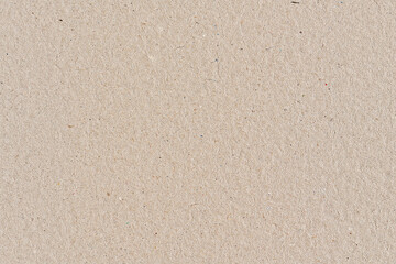 Beige color cardboard recycled paper, seamless tileable texture, image width 20cm