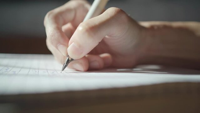 Writing with fountain pen and notebook