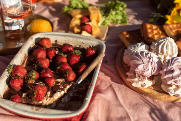Different food on a picnic in the park