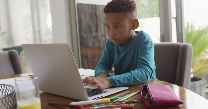 Video of african american boy doing homework