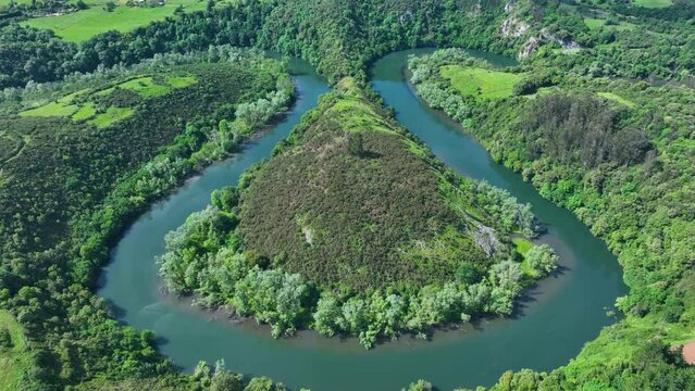 Aerial view of the meanders of the Nora river in the Pria&ntilde;es environment, Asturias, Spain, Europe