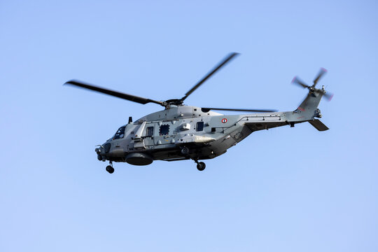Luqa, Malta - June 26, 2022: French Navy NHI NH-90 NFH (Reg.: 6) helicopter performing some approaches on runway 23 in the early morning.
