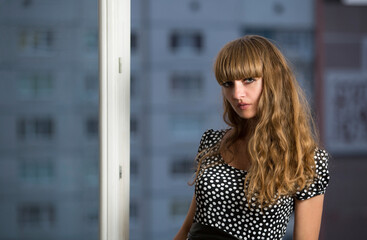 Woman standing at the window